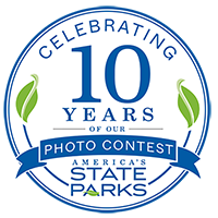 10YEARSBADGE1-Xsmall.png